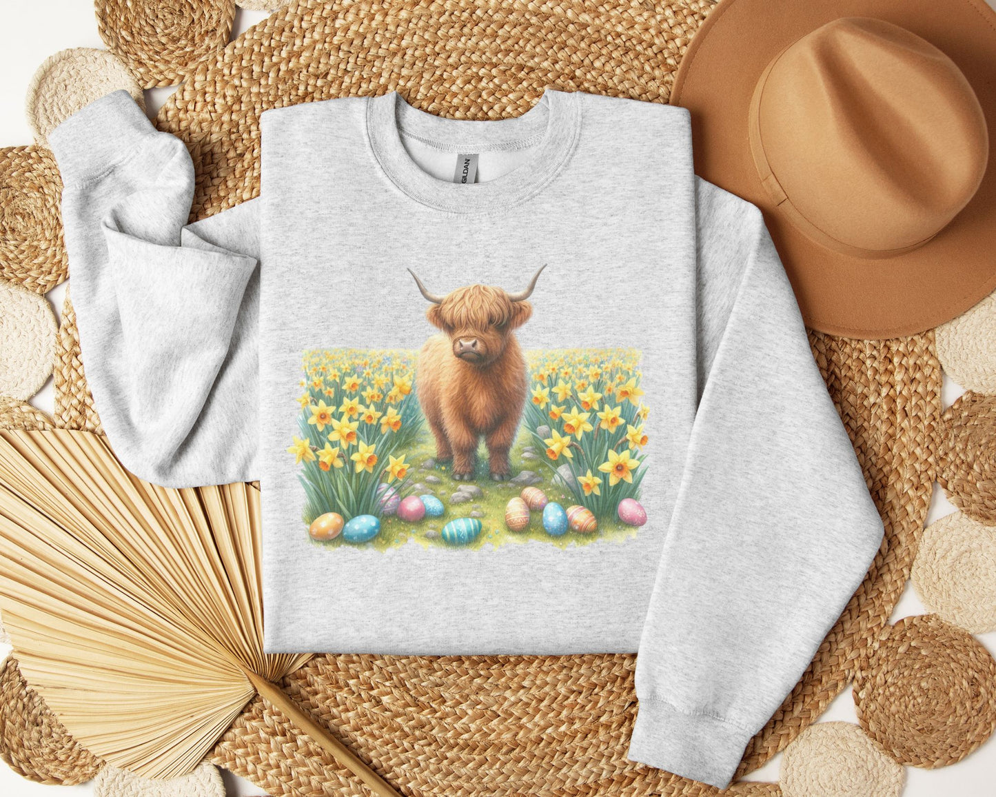 Easter Highland cow in field